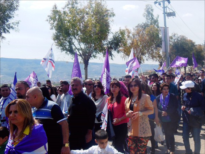 ‪‬ المسيرة يجتمع فيها الآشوريون من جميع أنحاء العراق(الجزيرة نت)