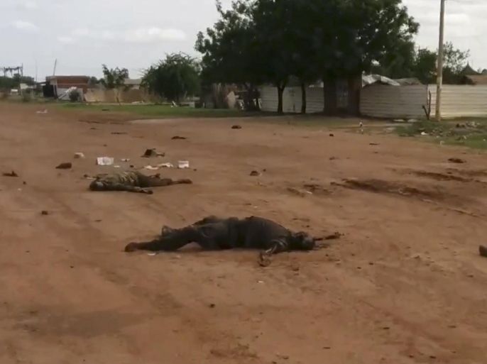 In this image taken from video, dead bodies lie on the road near Bentiu, South Sudan, on Sunday, April 20, 2014. The United Nations' top humanitarian official in South Sudan, Toby Lanzer, told The Associated Press in a phone interview on Tuesday, April 22, 2014, that the ethnically targeted killings are "quite possibly a game-changer" for a conflict that has been raging since mid-December and that has exposed longstanding ethnic hostilities. There was also a disturbing echo of Rwanda, which is marking the 20th anniversary this month of its genocide that killed 1 million people. (AP Photo/Toby Lanzer, United Nations)