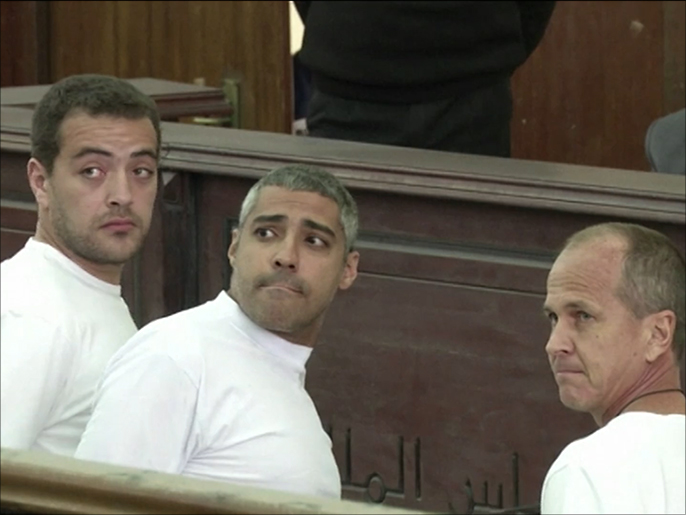 ‪محاكمة الصحفيين الثلاثة بدأت في فبراير/شباط الماضي بتهم وصفت بالمسيسة‬ (الجزيرة)