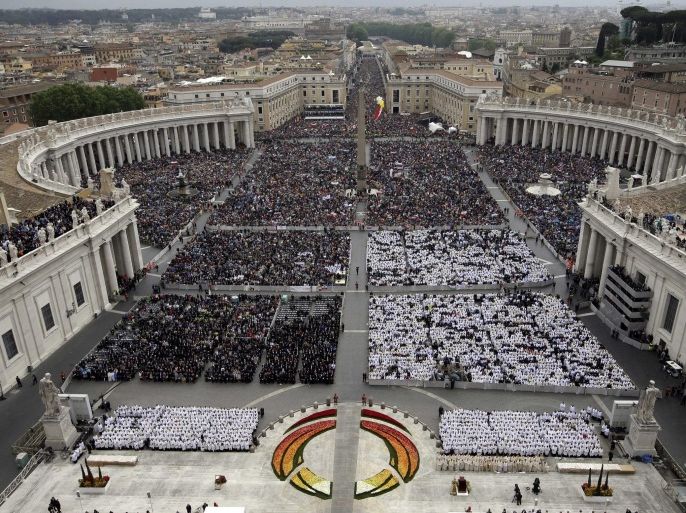 Faithful fill St. Peter's Square at the Vatican, Sunday, April 27, 2014. Pope Francis has declared his two predecessors John XXIII and John Paul II saints in an unprecedented canonization ceremony made even more historic by the presence of retired Pope Benedict XVI. (AP Photo/Andrew Medichini)