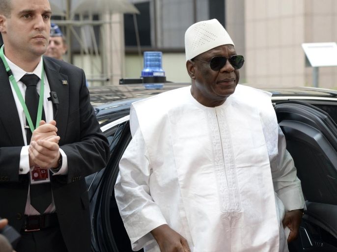 The President of Mali Ibrahim Boubacar Keita arrives for the second day of 4th EU-Africa summit on April 3, 2014 at the EU Headquarters in Brussels. European and African leaders discussed of additional assistance to the Central African Republic to prevent it from sinking further into violence after the EU decision to deploy its military mission. About 80 European and African leaders met in Brussels for the 4th EU-Africa summit, the agenda with security issues, especially in Central, immigration and trade. AFP PHOTO / THIERRY CHARLIER
