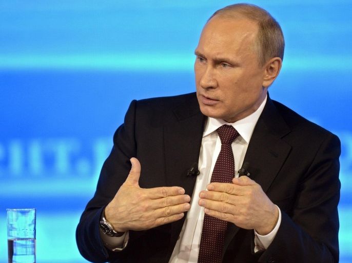 Russian President Vladimir Putin speaks during a nationally televised question-and-answer session in Moscow on Thursday, April 17, 2014. President Vladimir Putin has urged an end to the blockade of Moldova’s separatist province of Trans-Dniester. Trans-Dniester, located in eastern part of Moldova on border with Ukraine, has run its own affairs without international recognition since a 1992 war. Russian troops are stationed there. (AP Photo/RIA Novosti, Alexei Nikolsky, Presidential Press Service)