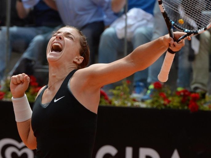 Italian tennis player Sara Errani jubilates after winning the match against Chinese tennis player Na Li, at the Italian Open tennis tournament at the Foro Italico in Rome, Italy, 16 May 2014.