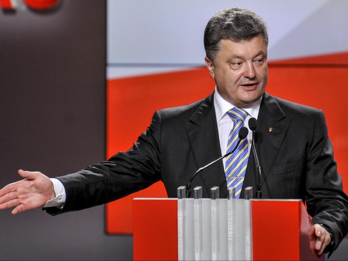 إعلان بوروشينكو الهدنة بشرق أوكرانيا قوبل بانتقاد من الكرملين (أسوشيتد برس-أرشيف)