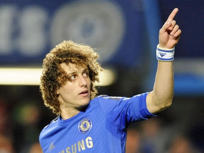 (FILE) A file picture dated 31 October 2012 of Chelsea's David Luiz celebrating after scoring form the penalty spot during the Capital One Cup soccer match between Chelsea FC and Manchester United at Stamford Bridge in London, Britain. Brazilian defender David Luiz is set to join French soccer club Paris Saint-Germain on a record transfer fee for a defender close to 50 million pounds (62 million euro), according to the London Evening Standard on 23 May 2014. EPA/GERRY PENNY *** Local Caption *** 50578976