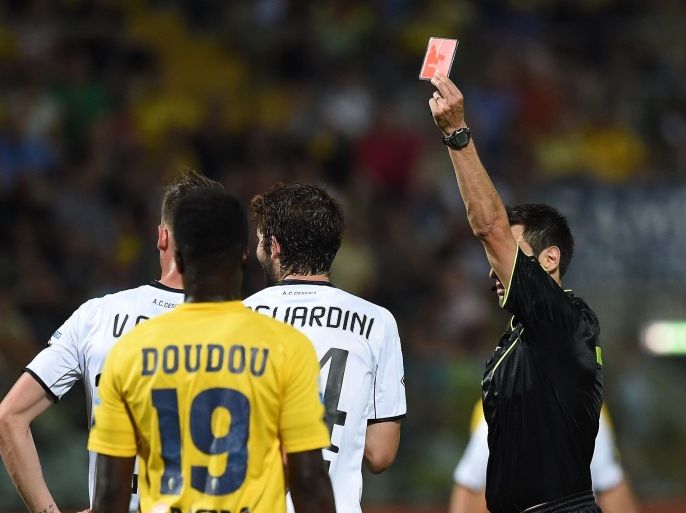 MODENA, ITALY - JUNE 08: Referee Maurizio Mariani shows the red card to Roberto Gagliardini of Cesena during the Serie B playoff match between Modena FC and AC Cesena at Alberto Braglia Stadium on June 8, 2014 in Modena, Italy.
