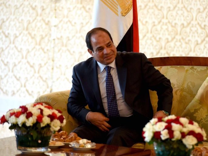 Egypt's president Abdel Fattah al-Sisi meets with Algerian Senate speaker Abdelkader Bensalah (unseen) upon his arrival at Houari-Boumediene International Airport on June 25, 2014 in Algiers. Sisi arrived in Algeria for his first trip abroad since being elected in May and he is expected to meet President Abdelaziz Bouteflika, notably to discuss ways of 'promoting the brotherly relations and cooperation that exist between the two countries and on issues linked to the situation in the Arab world and Africa'. AFP PHOTO/FAROUK BATICHE
