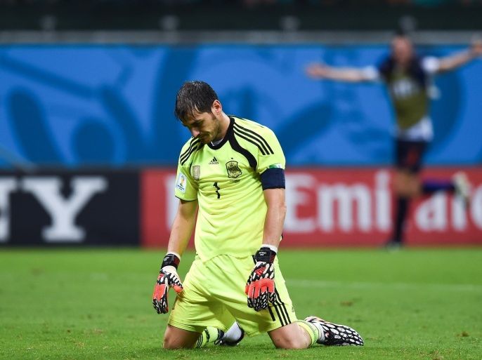 SALVADOR, BRAZIL - JUNE 13: Iker Casillas of Spain looks dejected after the Netherlands second goal during the 2014 FIFA World Cup Brazil Group B match between Spain and Netherlands at Arena Fonte Nova on June 13, 2014 in Salvador, Brazil.