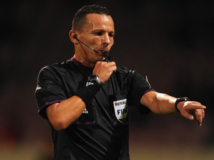CASABLANCA, MOROCCO - NOVEMBER 16: Referee Djamel Haimoudi of Algeria officiates during the FIFA 2014 World Cup Qualifier Play-off Second Leg between Senegal and Ivory Coast at Stade Mohammed V on November 16, 2013 in Casablanca, Morocco.