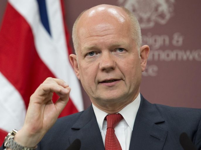 FILE - This is a Thursday, May 15, 2014 file photo of Britain's Foreign Secretary William Hague speaks during his press conference after the "Friends of Syria Meeting" at the Foreign Office in London. Hague said "circumstances are right" to reopen Britain's closed embassy in Iran. In a statement he told Parliament Tuesday June 17, 2014 that he is satisfied that British embassy personnel in Iran would be safe in Tehran and would be allowed to work without hindrance. (AP Photo/Jacquelyn Martin, pool, File)