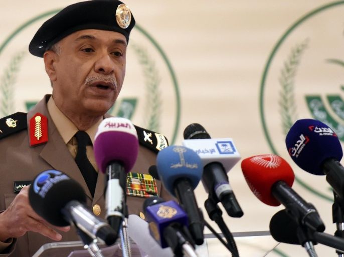 Saudi Interior ministry's spokesman Mansur al-Turki speaks during a press conference at the Saudi Officers club on July 5, 2014 in Riyadh. Turki said that two suspected of al-Qaeda militants blew themselves up after being trapped inside a security public service building in southern Saudi Arabia, following an attack on a border post with Yemen that left five security officers dead on the two sides of the border. AFP PHOTO/FAYEZ NURELDINE