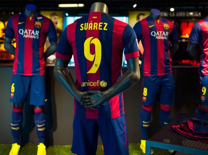 BARCELONA, SPAIN - JULY 12: A shirt of new FC Barcelona player Luis Suarez are seen on display at the FC Barcelona official store on July 12, 2014 in Barcelona, Spain.