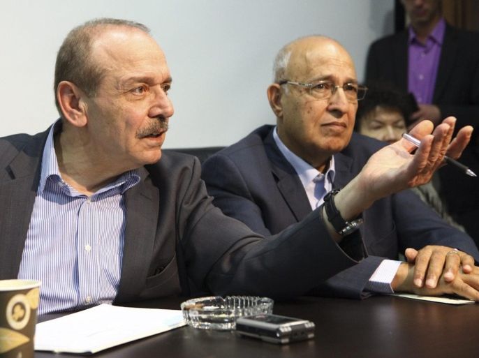 Secretary General of the Executive Committee Yasser Abed Rabbo (L) and a member of the Palestinian negotiating team Nabil Shaath (R) attend a meeting of Israeli Likud & Shas party members with senior Palestinian officials Yasser Abed Rabbo and Nabil Shaath at PLO (Palestinian Liberation Organization) offices in Ramallah, 07 July 2012. The meeting was organized by Geneva initiative organization and that was an introductory meeting to discuss the possibility of resuming direct peace talks between the PLO seniors and Israel's Likud and Shas party members.