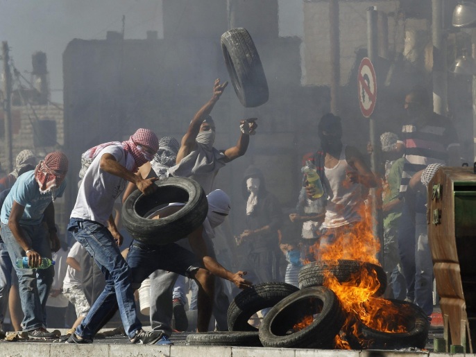 ‪احتجاجات سابقة بالقدس على حرق مستوطنين الفتى أبو خضير حيا‬ (رويترز)