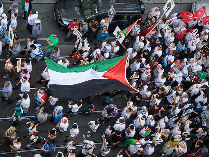 ‪جانب من تظاهرة في النمسا تستنكر العدوان الإسرائيلي على غزة‬ (الجزيرة)