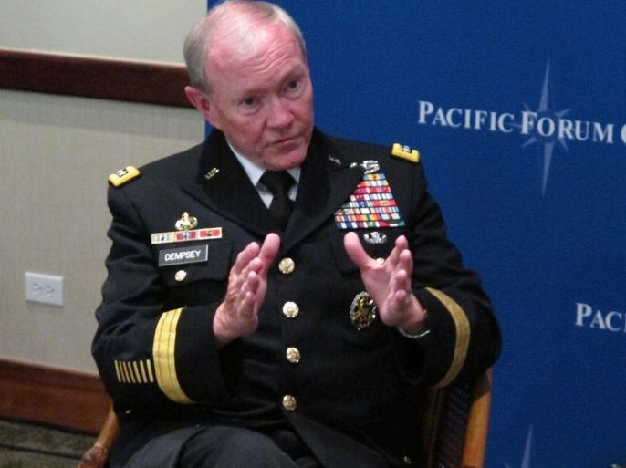Gen. Martin Dempsey, chairman of the Joint Chiefs of Staff, speaks to reporters after a forum on military issues in Honolulu on Tuesday, July 1, 2014. (AP Photo/Oskar Garcia)