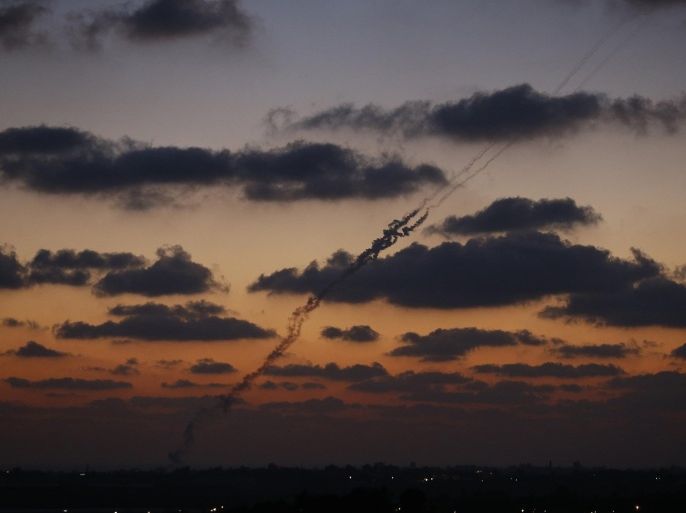 A smoke trail is seen as a rocket is launched from the northern Gaza Strip towards Israel July 16, 2014. Israel on Wednesday agreed to a proposed six-hour cessation of hostilities in the Gaza Strip for humanitarian reasons, a Israeli senior official told Reuters. The official, speaking on condition of anonymity, said it had not yet been decided when the lull would take place. Hamas had no immediate comment. REUTERS/Baz Ratner (GAZA - Tags: POLITICS CIVIL UNREST CONFLICT TPX IMAGES OF THE DAY)