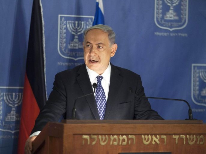 Israel's Prime Minister Benjamin Netanyahu speaks during a joint news conference with Germany's Foreign Minister Frank-Walter Steinmeier (not pictured) in Tel Aviv July 15, 2014. Israel sees in the Egyptian-proposed Gaza truce an opportunity to strip the Palestinian enclave of rockets but is prepared to redouble military action there if the cross-border launches persist, Netanyahu said on Tuesday. REUTERS/Dan Balilty/Pool (ISRAEL - Tags: POLITICS CIVIL UNREST)