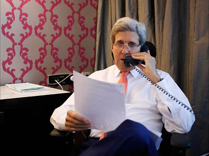 U.S. Secretary of State John Kerry speaks on the phone to Israeli Prime Minister Benjamin Netanyahu about the terms of a ceasefire in Israel's fight against Islamist militants in Gaza, from his hotel suite in Cairo July 25, 2014. REUTERS/Pool (EGYPT - Tags: POLITICS CONFLICT CIVIL UNREST TPX IMAGES OF THE DAY)