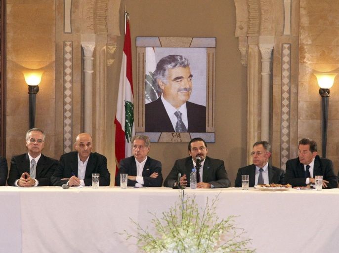Former prime minister Saad al-Hariri (C) heads a meeting with the members of the "14 March Alliance" as former President Amin Gemayel (5th L) and Samir Geagea (4th L), leader of the Christian Lebanese Forces listen in Beirut August 8, 2014. Al-Hariri returned to Lebanon on Friday for the first time in three years, on a visit seen as reasserting a moderate influence over the Sunni community following a deadly incursion by Islamist militants. REUTERS/Dalati Nohra/Handout via Reuters (LEBANON - Tags: POLITICS) ATTENTION EDITORS - THIS PICTURE WAS PROVIDED BY A THIRD PARTY. REUTERS IS UNABLE TO INDEPENDENTLY VERIFY THE AUTHENTICITY, CONTENT, LOCATION OR DATE OF THIS IMAGE. FOR EDITORIAL USE ONLY. NOT FOR SALE FOR MARKETING OR ADVERTISING CAMPAIGNS. THIS PICTURE IS DISTRIBUTED EXACTLY AS RECEIVED BY REUTERS, AS A SERVICE TO CLIENTS