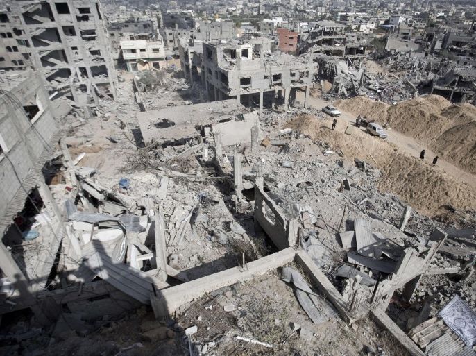 A general view shows the destruction in part of Gaza City's al-Tufah neighbourhood as the fragile ceasefire in the Gaza Strip entered a second day on August 6, 2014 while Israeli and Palestinian delegations prepared for crunch talks in Cairo to try to extend the 72-hour truce. The ceasefire, which came into effect on August 5, has brought relief to both sides after one month of fighting killed 1,875 Palestinians and 67 people on the Israeli side. AFP PHOTO / MAHMUD HAMS