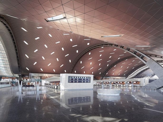 This undated handout image released by the New Hamad International Airport (HIA) which opened on Wednesday, April 30, 2014, shows the inside of the empty terminal. The massive new airport in the Qatari capital has started handling its first commercial flights after years of delays as the natural-gas rich Gulf nation works to transform itself into a major aviation hub. (AP Photo/HIA)