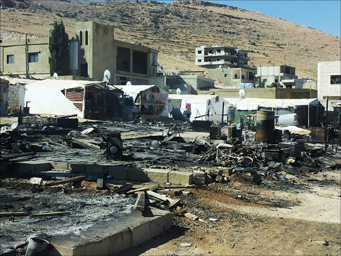 ‪قصف الجيش اللبناني للمسلحين سبب دمارا كبيرا في بلدة عرسال‬ (الجزيرة)