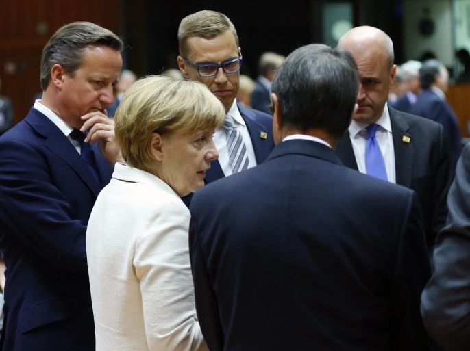 Britain's Prime Minister David Cameron (L-R), German Chancellor Angela Merkel, Finland's Prime Minister Alexander Stubb, Cyprus' President Nicos Anastasiades and Sweden's Prime Minister Fredrik Reinfeldt hold a discussion at the start of a European Union summit in Brussels August 30, 2014. European Union leaders will threaten Russia with new sanctions over Ukraine on Saturday but, fearful of a new Cold War and self-inflicted harm to their own economies, should give Moscow another chance to make peace. REUTERS/Yves Herman (BELGIUM - Tags: POLITICS)