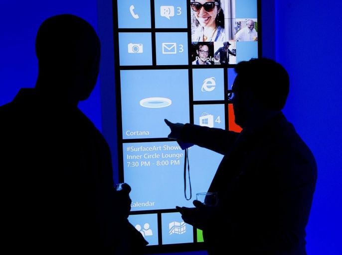 People are demonstrated to 'Cortana' by Microsoft, a new personal assistant software, at an event hosted by Microsoft in New York, New York, USA, 04 June 2014. Cortana will debut as part of Windows Phone 8.1.