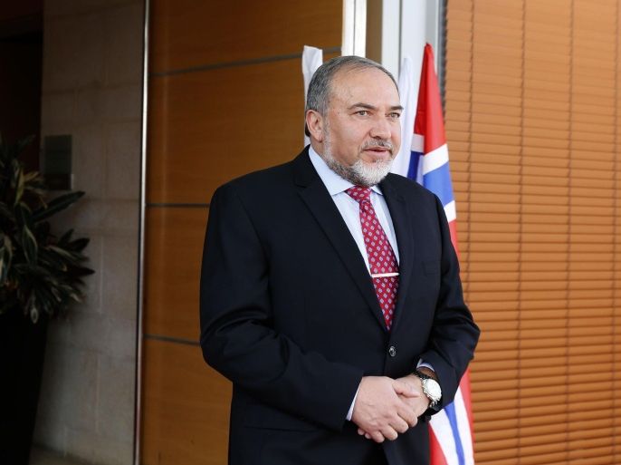 Israeli Foreign Minister Avigdor Lieberman stands waiting for his Norwegian counterpart Borge Brende before a meeting at the Foreign Affairs Ministry on September 7, 2014 in Jerusalem. AFP PHOTO/GALI TIBBON