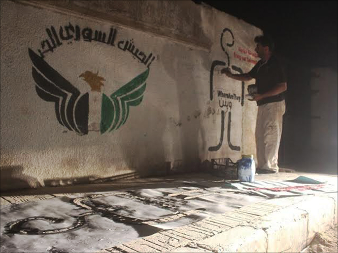 ‪رسومات الحملة في ريف إدلب‬ (الجزيرة)