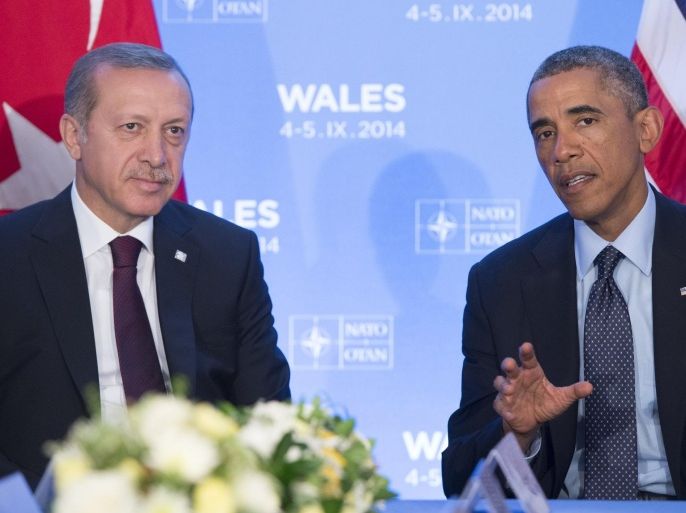 US President Barack Obama (R) and Turkey's Prime Minister Recep Tayyip Erdogan (L) talk at a bilateral meeting on the second day of the NATO 2014 Summit at the Celtic Manor Resort in Newport, South Wales, on September 5, 2014. NATO leaders agreed Friday to set up a new force to meet emerging global security threats and to maintain a 'continuous' presence in an eastern Europe rattled by Russian moves in Ukraine. AFP PHOTO/SAUL LOEB