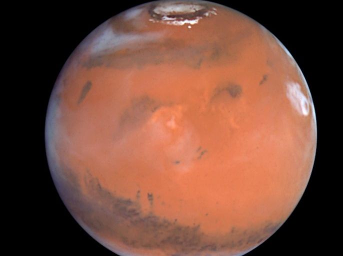 This 1999 Hubble telescope image shows Mars when Mars was 54 million miles (87 million kilometers) from Earth. A NASA spacecraft designed to investigate how Mars lost its water is expected to put itself into orbit around the Red Planet on Sunday after a 10-month journey. After traveling 442 million miles (711 million km) from Earth, the Mars Atmosphere and Volatile Evolution, or MAVEN, probe faces a do-or-die burn of its six braking rockets beginning at 9:37 p.m. EDT/0137 GMT. REUTERS/NASA/Handout (OUTER SPACE - Tags: ENVIRONMENT SCIENCE TECHNOLOGY) FOR EDITORIAL USE ONLY. NOT FOR SALE FOR MARKETING OR ADVERTISING CAMPAIGNS. THIS IMAGE HAS BEEN SUPPLIED BY A THIRD PARTY. IT IS DISTRIBUTED, EXACTLY AS RECEIVED BY REUTERS, AS A SERVICE TO CLIENTS