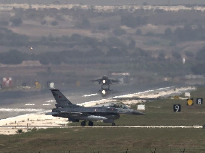 A US Air Force plane takes off as a Turkish Air Force fighter jet taxis at the Incirlik airbase, southern Turkey, Sunday, Sept. 1, 2013. U.S. President Barack Obama said he has decided that the United States should take military action against Syria in response to a deadly chemical weapons attack, but he said he will seek congressional authorization for the use of force.