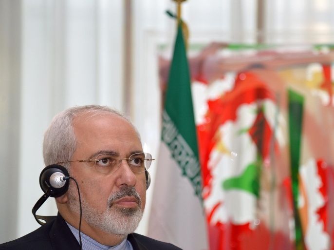 Iranian foreign minister Mohammad Javad Zarif attends a joint press conference with Italian foreign minister and new appointed European Union's foreign policy chief, Federica Mogherini (not seen) after a meeting in Rome's Farnesina headquarters on September 3, 2014. AFP PHOTO / ALBERTO PIZZOLI