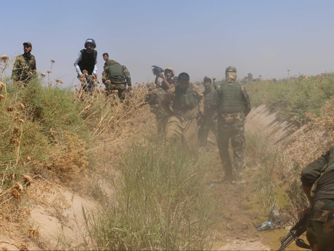 الاشتباكات بين البشمركة والقوات العراقية وبين تنظيم الدولة خلفت مقتل وجرح العشرات(رويترز)