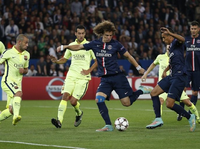 David Luiz (C) of Paris Saint Germain scores the 1-0 lead during the UEFA Champions League Groupe F soccer match between Paris Saint Germain and FC Barcelona at the Parc des Princes Stadium, in Paris, France, 30 September 2014.