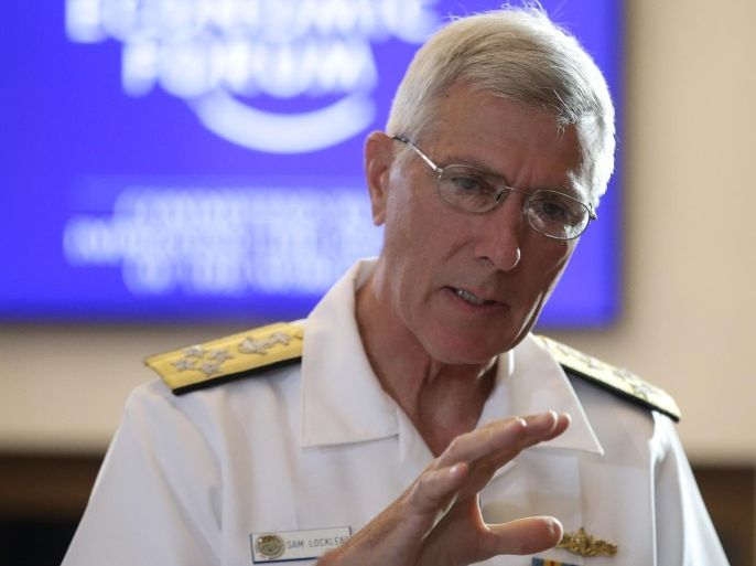 U.S. Pacific Command Commander Adm. Samuel J. Locklear III, gestures prior to the session on "Security Outlook" in the ongoing World Economic Forum on East Asia Friday, May 23, 2014 at the financial district of Makati city, east of Manila, Philippines. Locklear warns that the "risk of miscalculation" that could trigger a wider conflict in a tense territorial standoff between China and Vietnam is high and urged both nations to exercise restraint. Locklear also said Friday that the Asian neighbors should resolve their territorial conflicts on the basis of international law.(AP Photo/Bullit Marquez)
