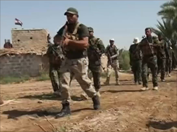 ‪استمرار المواجهات بين تنظيم الدولة والجيش العراقي‬ (الجزيرة)