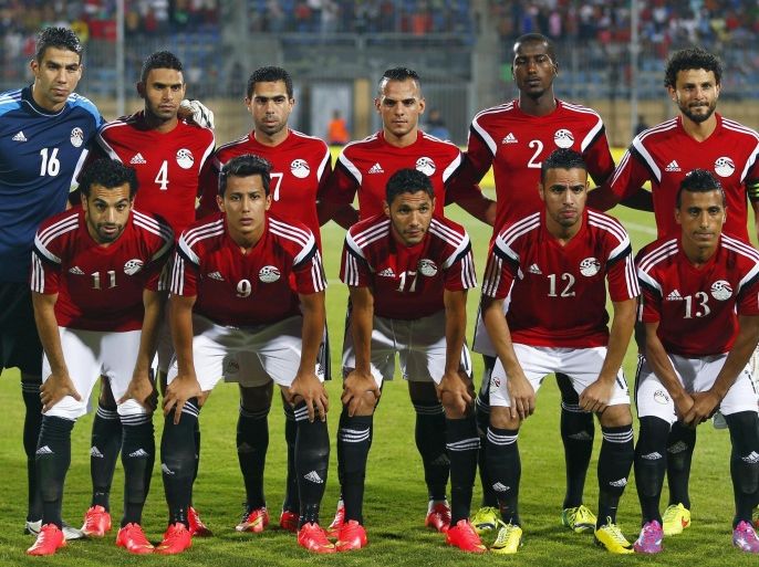 Egypt's soccer team players pose before their African Nations Cup qualifying soccer match against Tunisia in Cairo September 10, 2014. Back row (L-R): Sherif Ekramy, Mohamed Okka, Ahmed Fathy, Khaled Kamar, Ali Ghazal and Hossam Ghaly. Front row (L-R): Mohamed Salah, Amr Gamal, Mohamed El-Nenny, Hazem Emam and Mohamed Abdel-Shafy. REUTERS/Amr Abdallah Dalsh (EGYPT - Tags: SPORT SOCCER)
