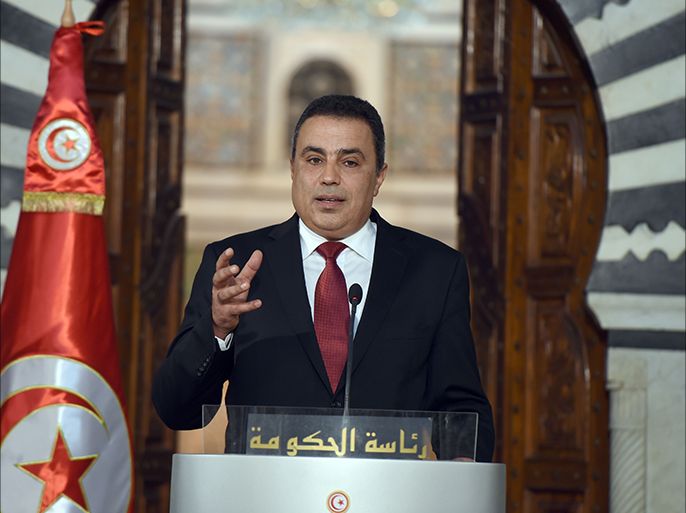Tunisian Prime Minister Mehdi Jomaa speaks during a press conference to announce he decided not to run for the up-coming presidential election on September 17, 2014 in Tunis. Tunisia is gearing up for a parliamentary election on October 26 and a presidential poll less than a month later, on November 23. AFP