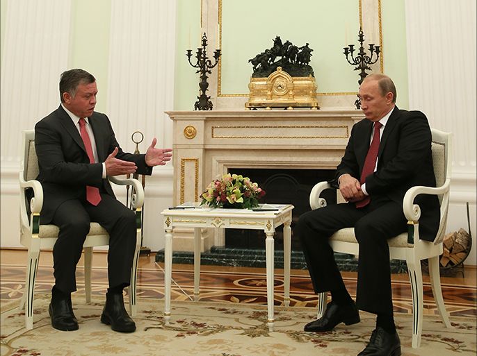 epa04428133 Russian President Vladimir Putin (R) and King Abdullah II of Jordan (L) meet in the Kremlin in Moscow, Russia, 02 October 2014. The talks are expected to focus on bilateral cooperation and to exchange views on regional issues, including the situation in Syria, Libya and the Middle East settlement. EPA/SERGEI ILNITSKY/POOL