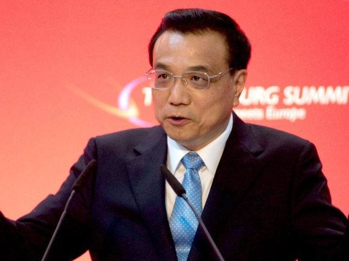 A photo made vailable by Hamburg's Chamber of Commerce of Chinese Premier Li Keqiang addressing the economic conference ' Hamburg summit: China meets Europe' in Hamburg, northern Germany 11 October 1014. EPA/HO