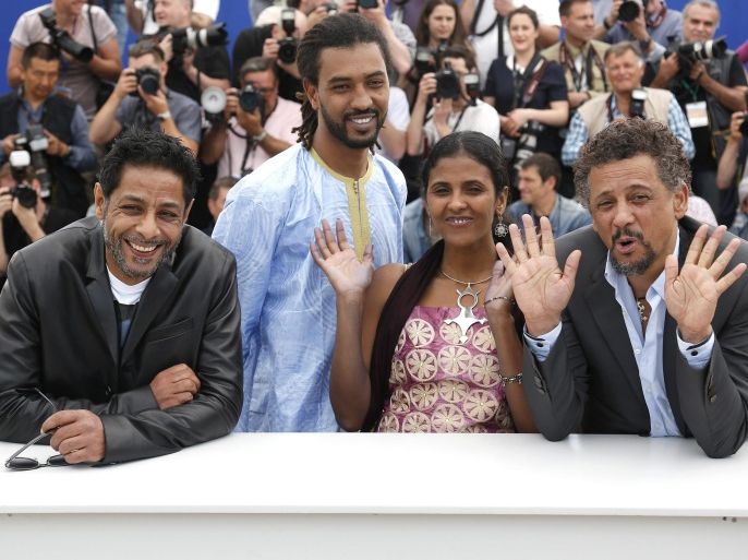 (L-R) Tunisian actor Hichem Yacoub, actor Ibrahim Ahmed aka Pino, actress Toulou Kiki and Tunisian actor Abel Jafri pose during the photocall for 'Timbuktu' at the 67th annual Cannes Film Festival, in Cannes, France, 15 May 2014. The movie is presented in the Official Competition of the festival which runs from 14 to 25 May.
