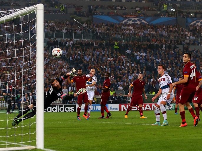 ROME, ITALY - OCTOBER 21: Arjen Robben of Bayern Muenchen scores the opening goal during the UEFA Champions League group E match between AS Roma and FC Bayern Muenchen at Stadio Olimpico on October 21, 2014 in Rome, Italy.