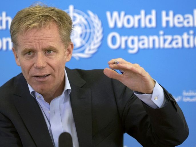 Bruce Aylward, World Health Organization assistant Director General in charge of the operational response on Ebola gestures during a news briefing at the WHO headquarters in Geneva October 14, 2014. REUTERS/Denis Balibouse (SWITZERLAND - Tags: POLITICS HEALTH)