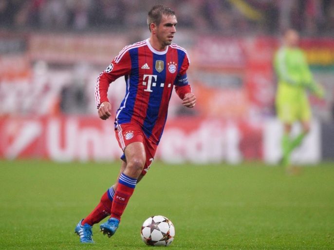 MUNICH, GERMANY - NOVEMBER 05: Philipp Lahm of Bayern Muenchen in action during the UEFA Champions League Group E match between FC Bayern Munchen and AS Roma at Allianz Arena on November 5, 2014 in Munich, Germany.