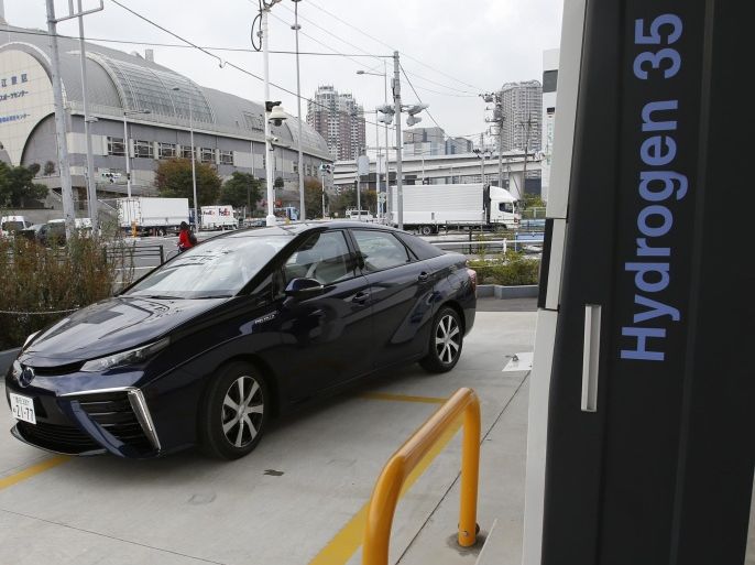 In this photo taken Monday, Nov. 17, 2014, a Toyota Motor Corp.'s new fuel cell vehicle Mirai arrives at a charge station near Toyota's showroom in Tokyo. There will only be a few hundred, and they won’t be cheap, but Toyota is about to take its first small step into the unproven market for emissions-free, hydrogen-powered vehicles. The world’s largest automaker announced Tuesday that it will begin selling fuel cell cars in Japan on Dec. 15 and in the U.S. and Europe in mid-2015. The sporty-looking, four-door Toyota Mirai will retail for 6.7 million yen ($57,600) before taxes. (AP Photo/Shizuo Kambayashi)