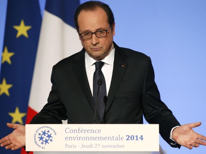 French President Francois Hollande delivers his speech during the Environmental Conference at the Elysee Palace in Paris, November 27, 2014. France will host the World Climate Conference in December 2015. REUTERS/Michel Euler/Pool (FRANCE - Tags: POLITICS)