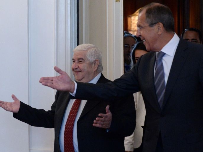 Russian Foreign Minister Sergei Lavrov (R) arrives with his Syrian counterpart Walid Muallem on September 9, 2013 for a meeting in Moscow. Muallem visits Russia for talks with the top global ally of Syrian President Bashar al-Assad as expectations grow of military action against the regime. Russia has vehemently opposed US-led strikes against the Assad regime, warning it could destabilize the whole Middle East, and President Vladimir Putin has vowed to help Syria if it was hit.